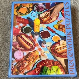 Piecework Puzzle: Buns Out. 1,000 pieces